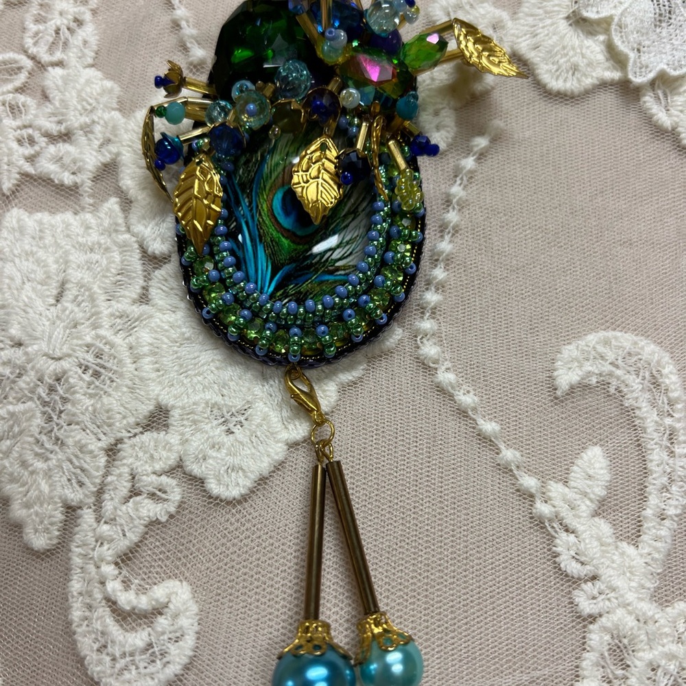 Elegant Gold and Green Peacock Brooch